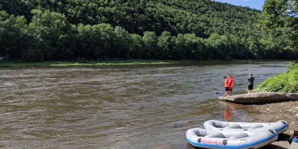 Kayakers and rafters on the Upper Delaware River near Barryville NY.