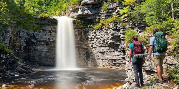 Hikers on a cliff-top trail at Minnewaska State Park Preserve in the Shawangunk Ridge, Ulster County, NY