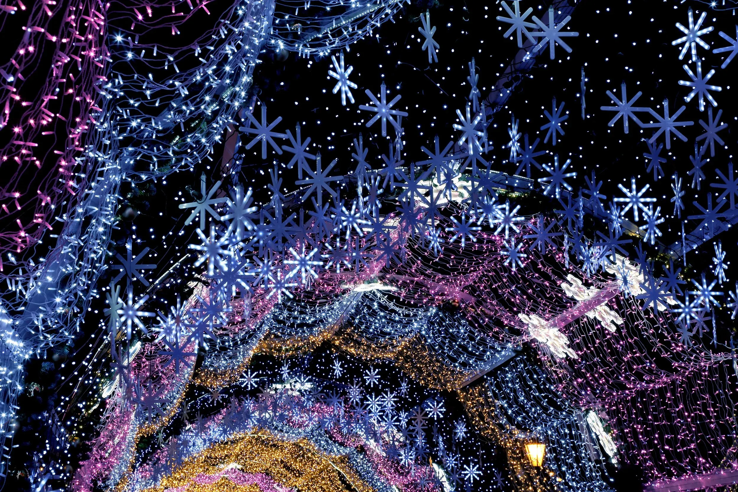 Drive-through Christmas light show in the Hudson Valley, New York with glowing tunnels and holiday displays