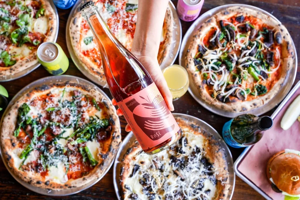 Wood fired pies and a bottle of cider