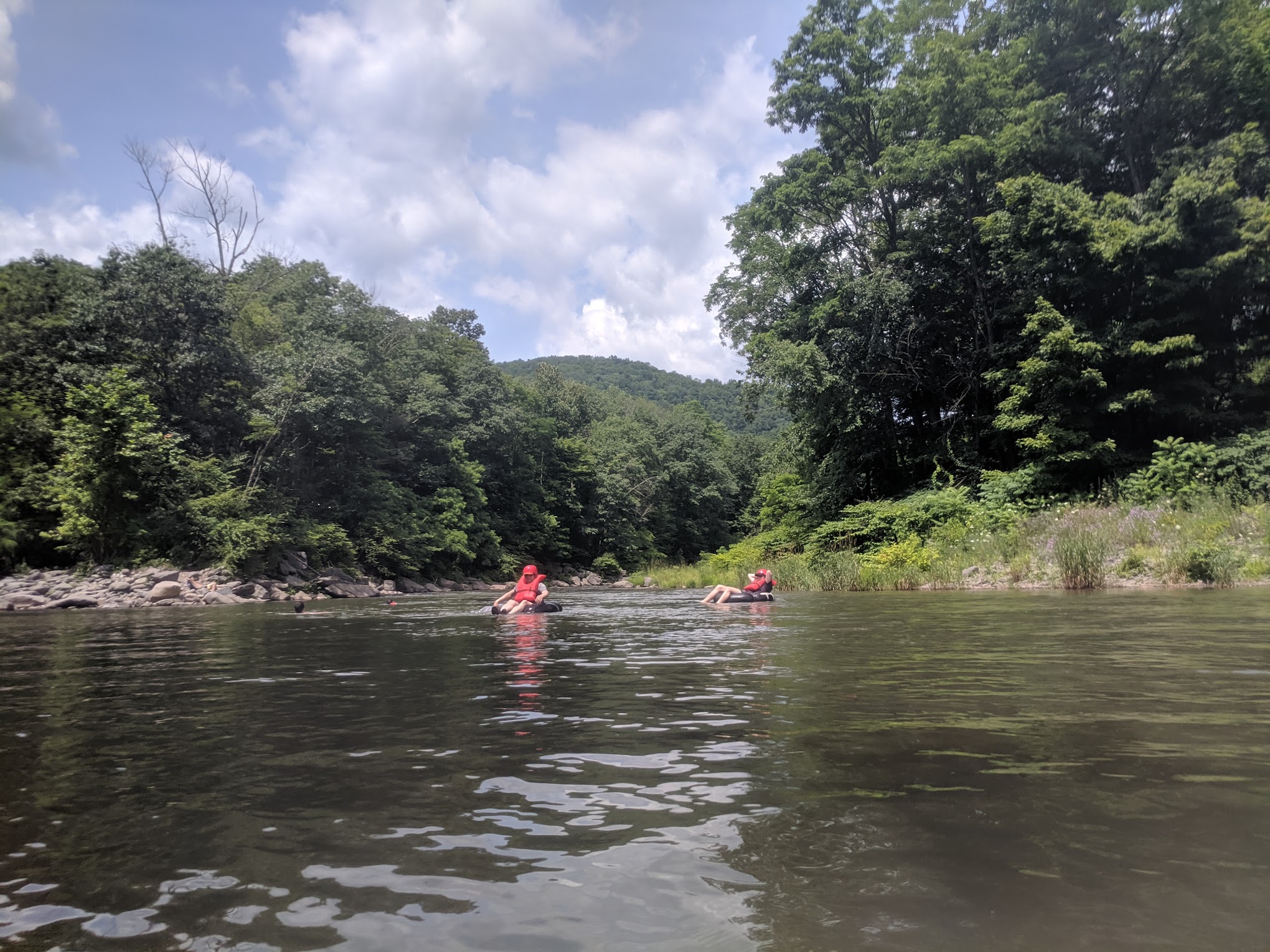 Tubers floating down the Esopus Creek in Phoenicia, near Fleischmanns NY.